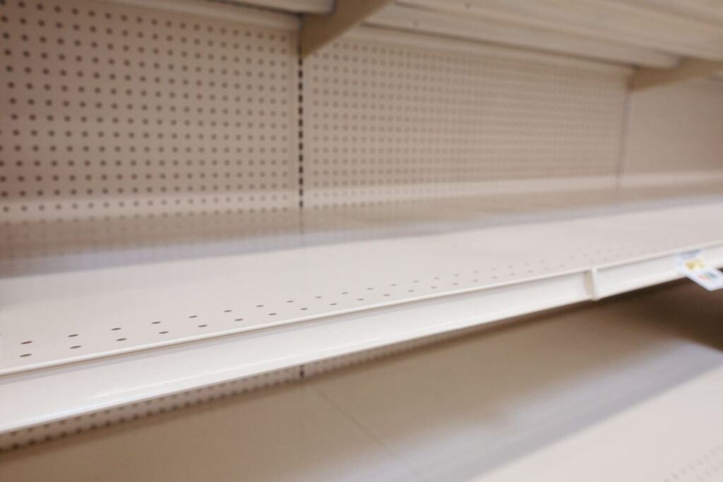 Retail Store Cleaning Shelves